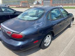 1998 Blue Ford Taurus