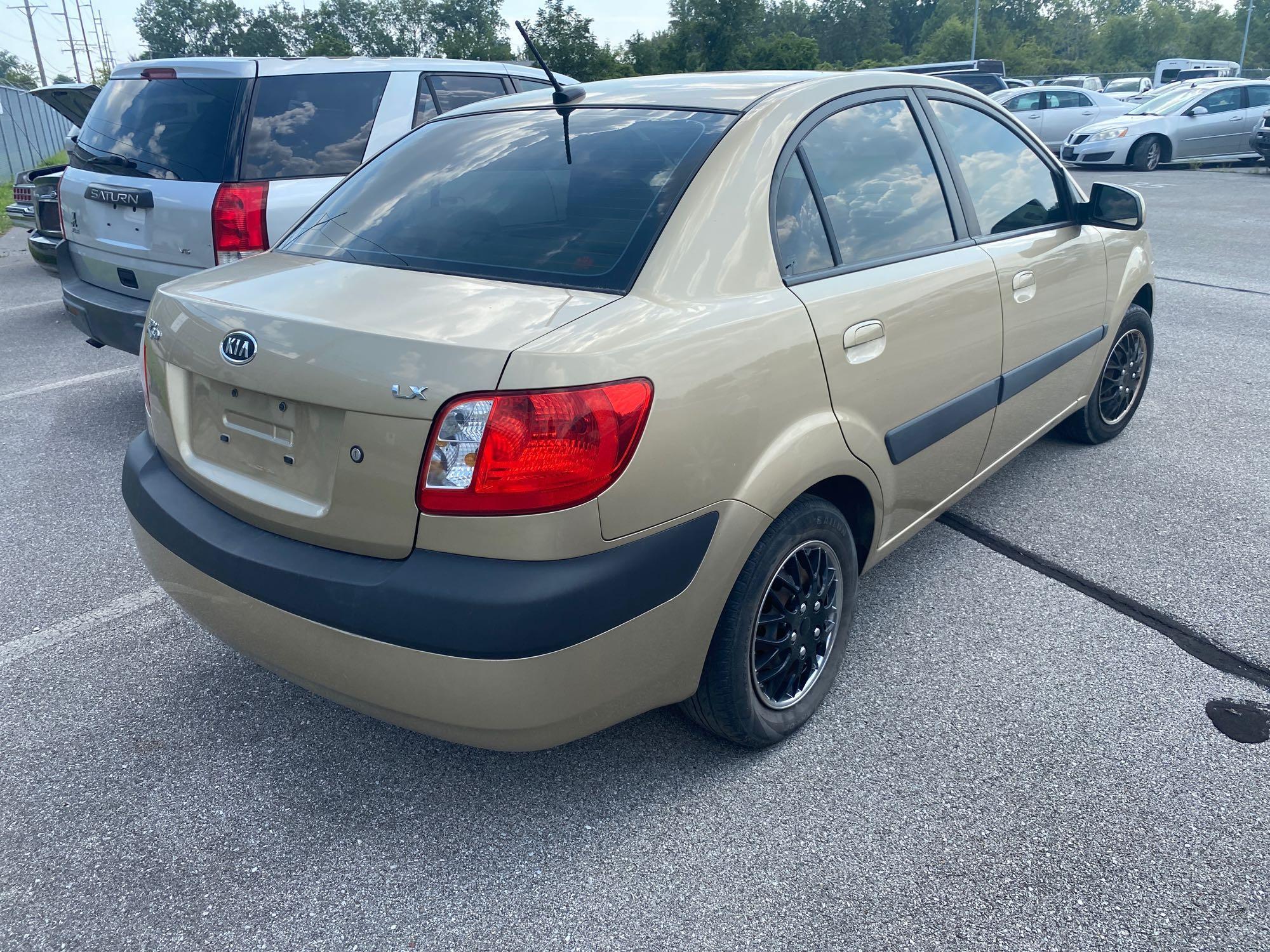 2009 Gold Kia Rio