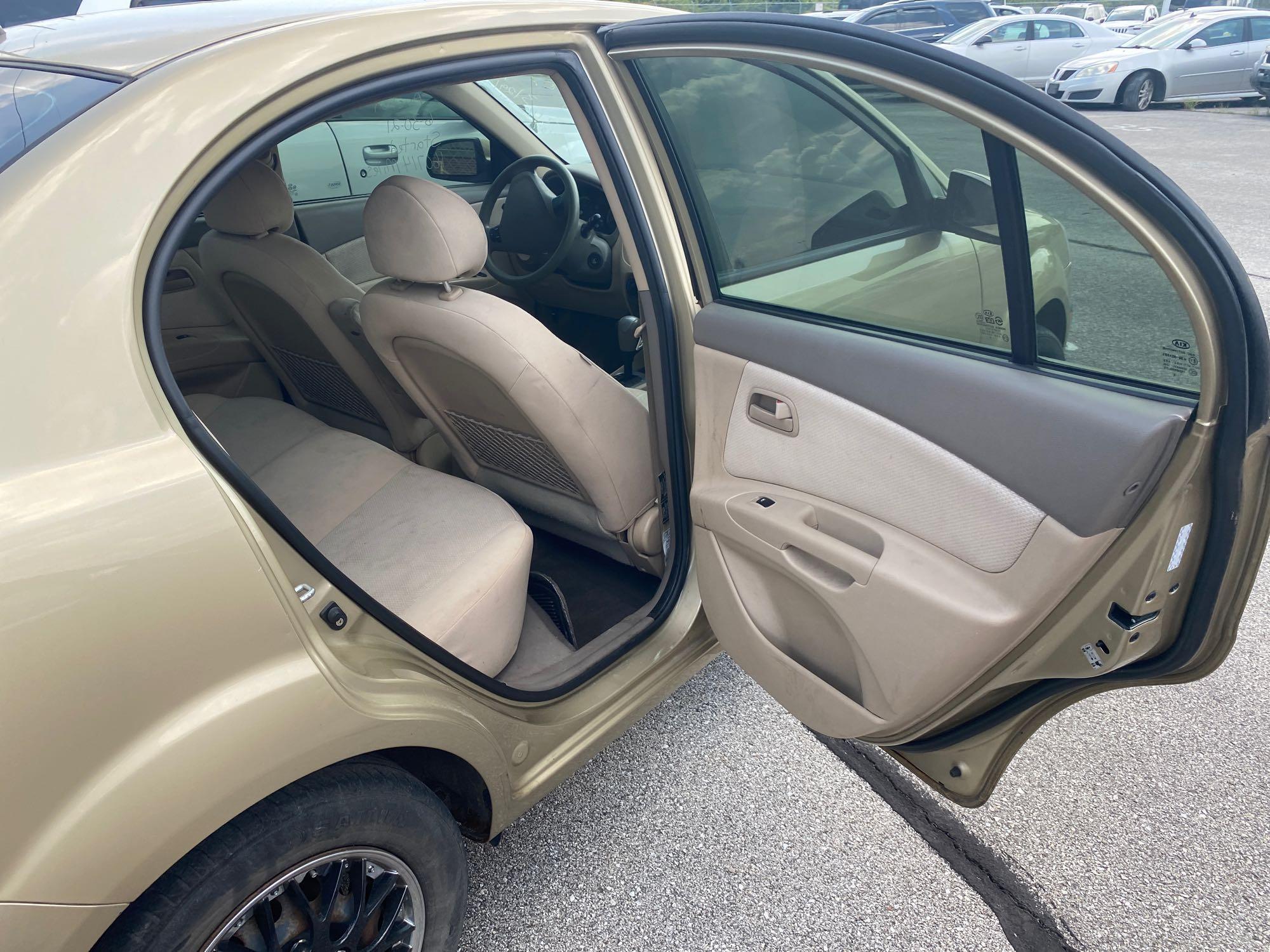 2009 Gold Kia Rio