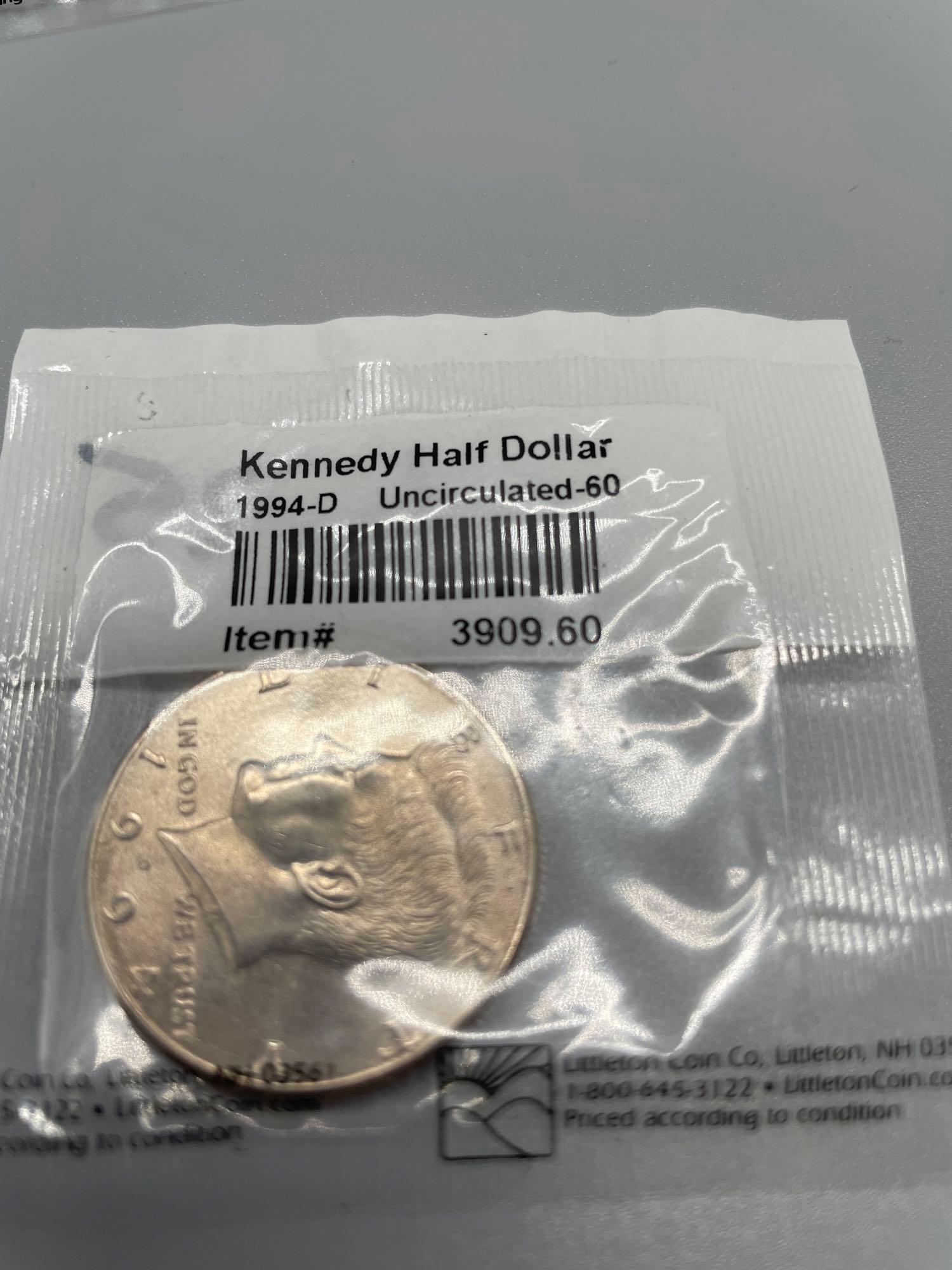 B- (8) Kennedy Half Dollars