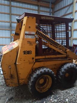 B- Case 1818 Skid Steer with Snow Plow, Bucket, and Forks
