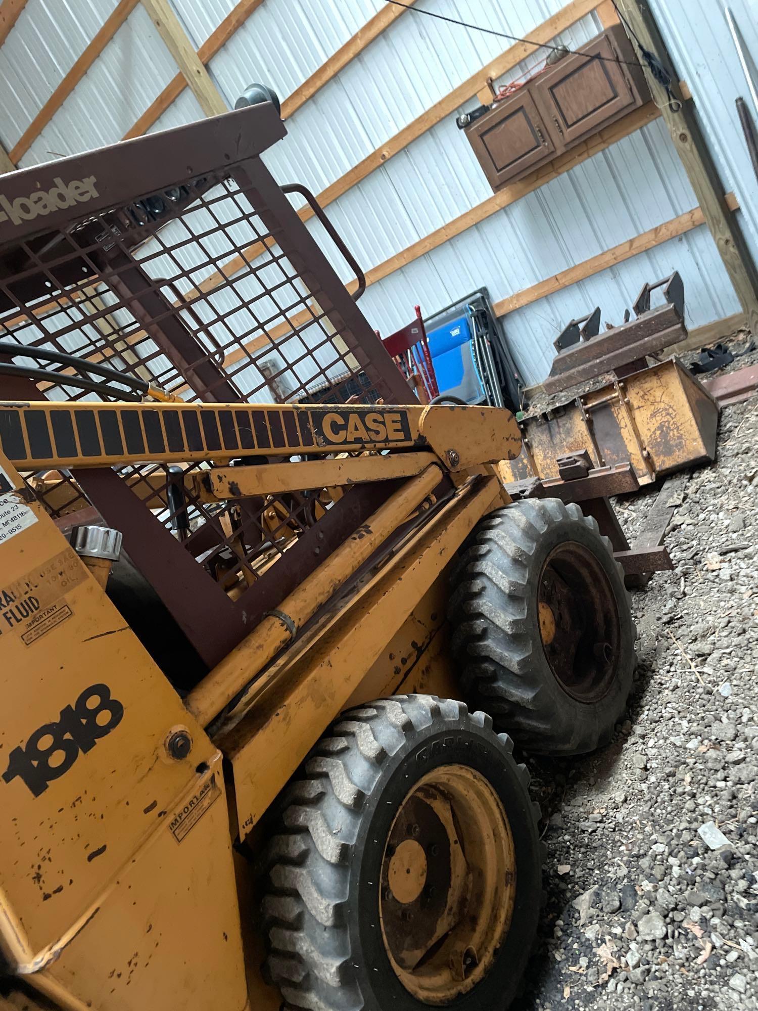 B- Case 1818 Skid Steer with Snow Plow, Bucket, and Forks