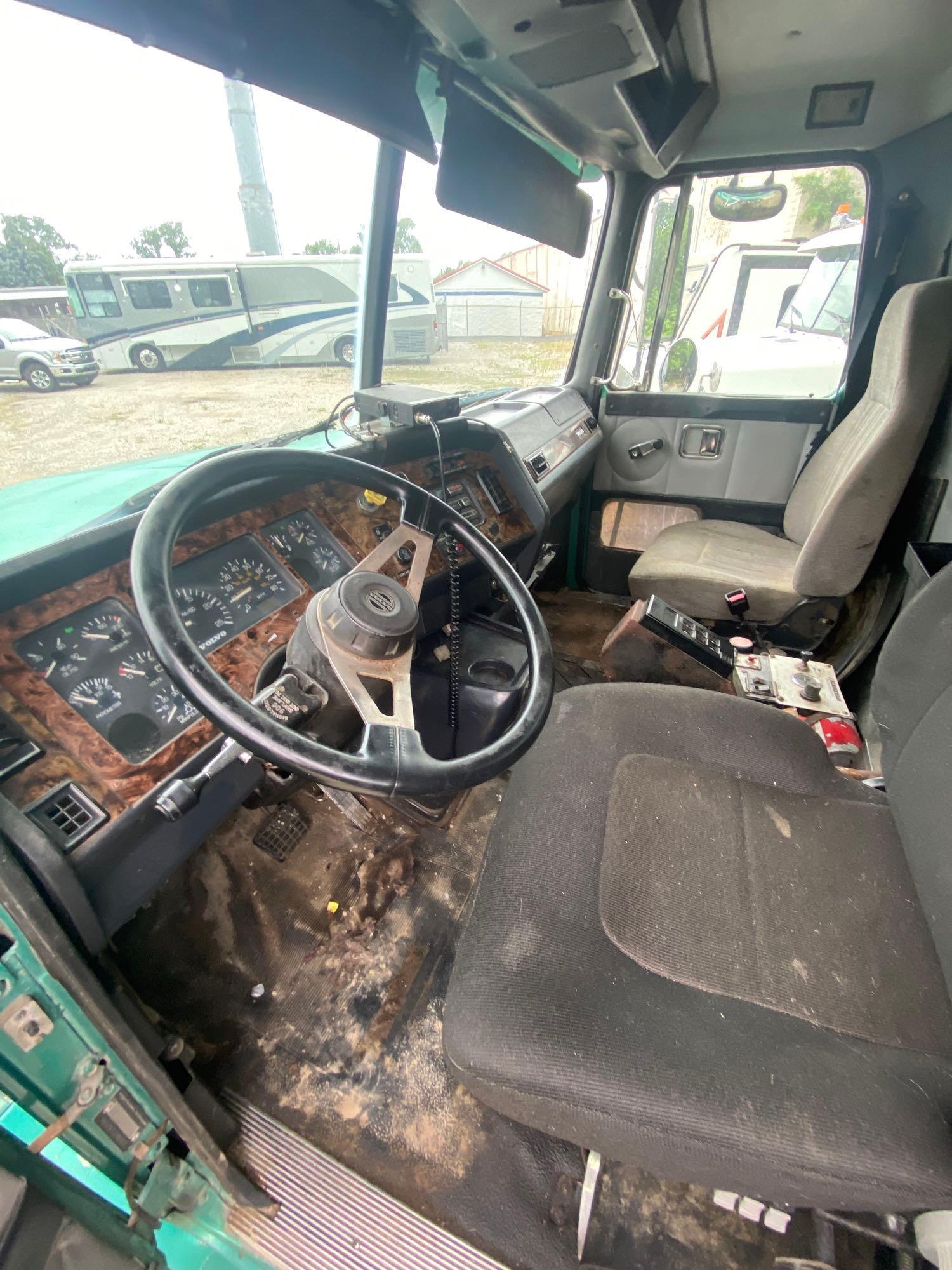 1997 Green Metallic Volvo Dump Truck