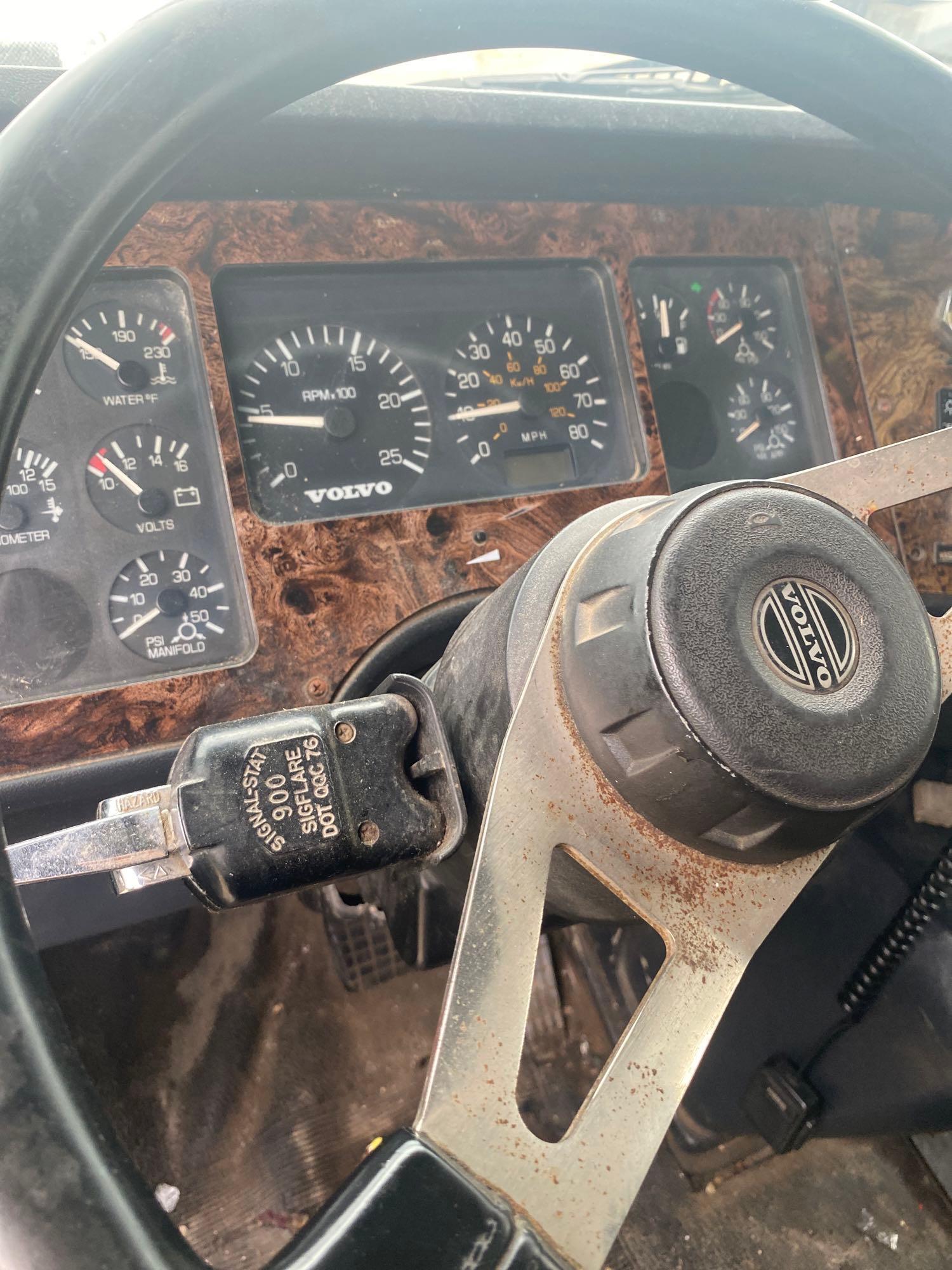 1997 Green Metallic Volvo Dump Truck