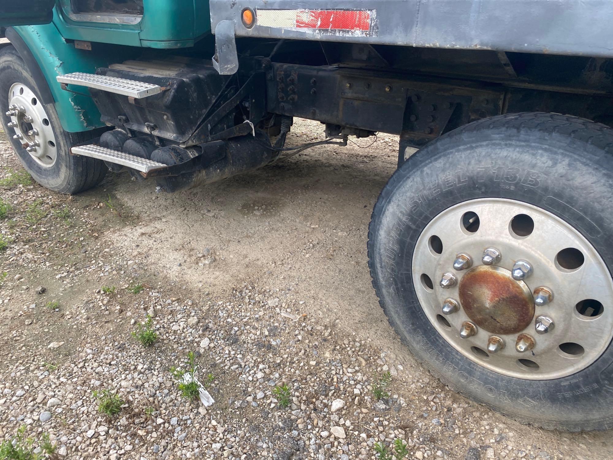 1997 Green Metallic Volvo Dump Truck