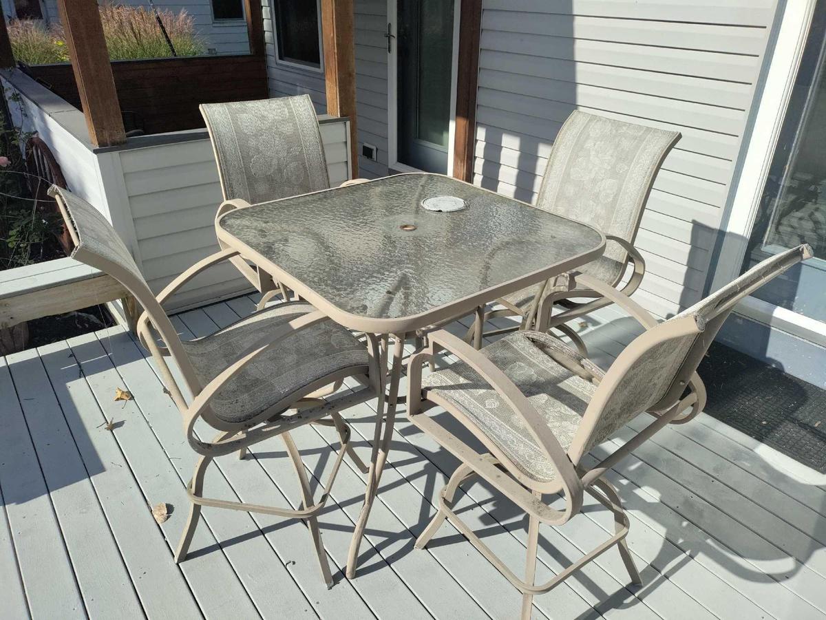 Outside- Glass Top Table and (4) Chairs