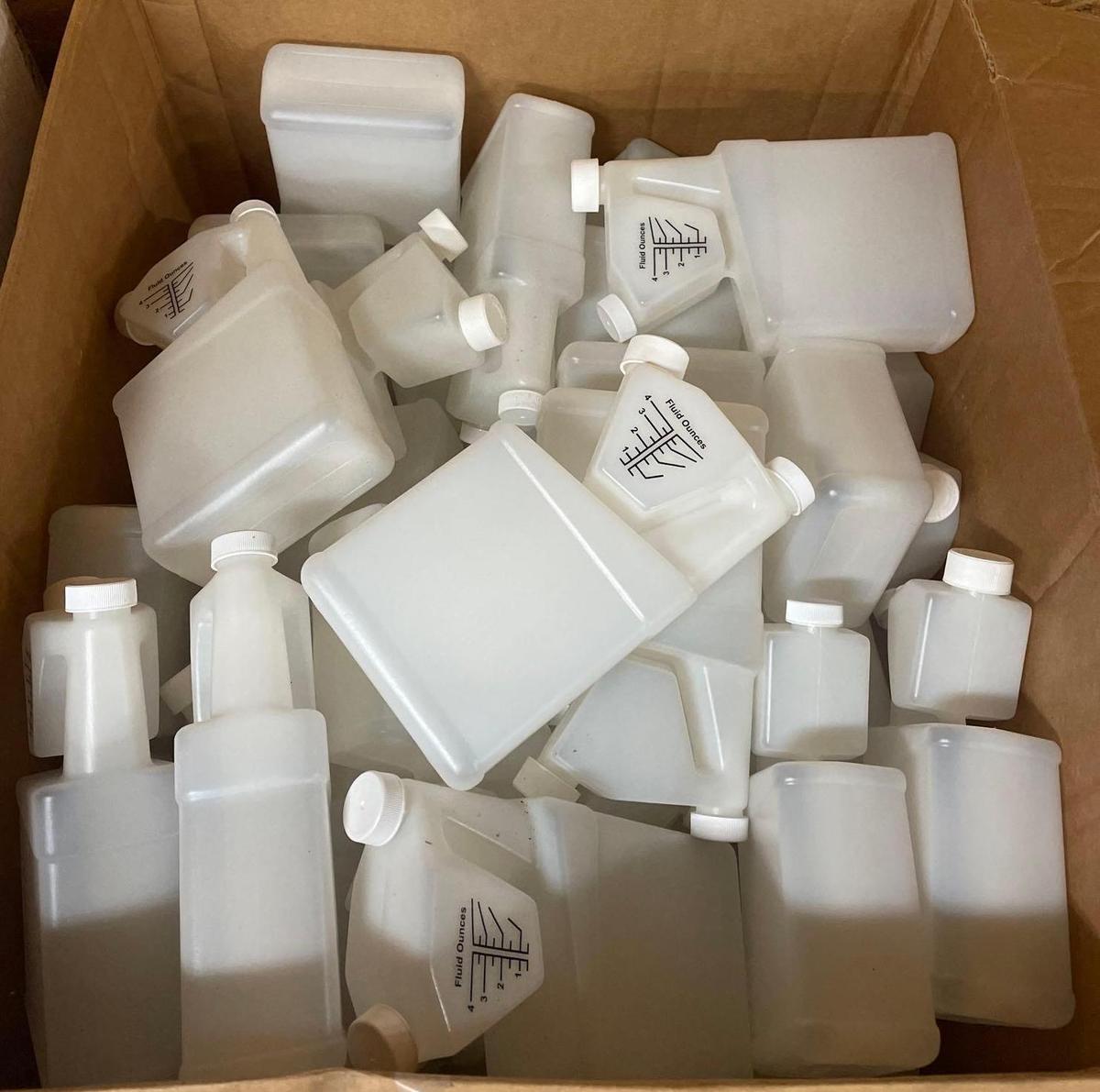B1 R1- (1) Box of Plastic Measuring Containers For Liquids/Chemicals
