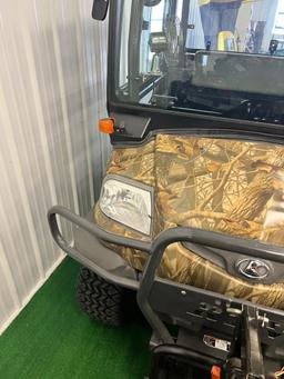 Kubota RTX900 Utility Vehicle, w/ snow plow, tonneau cover on bed, hydraulic dump bed