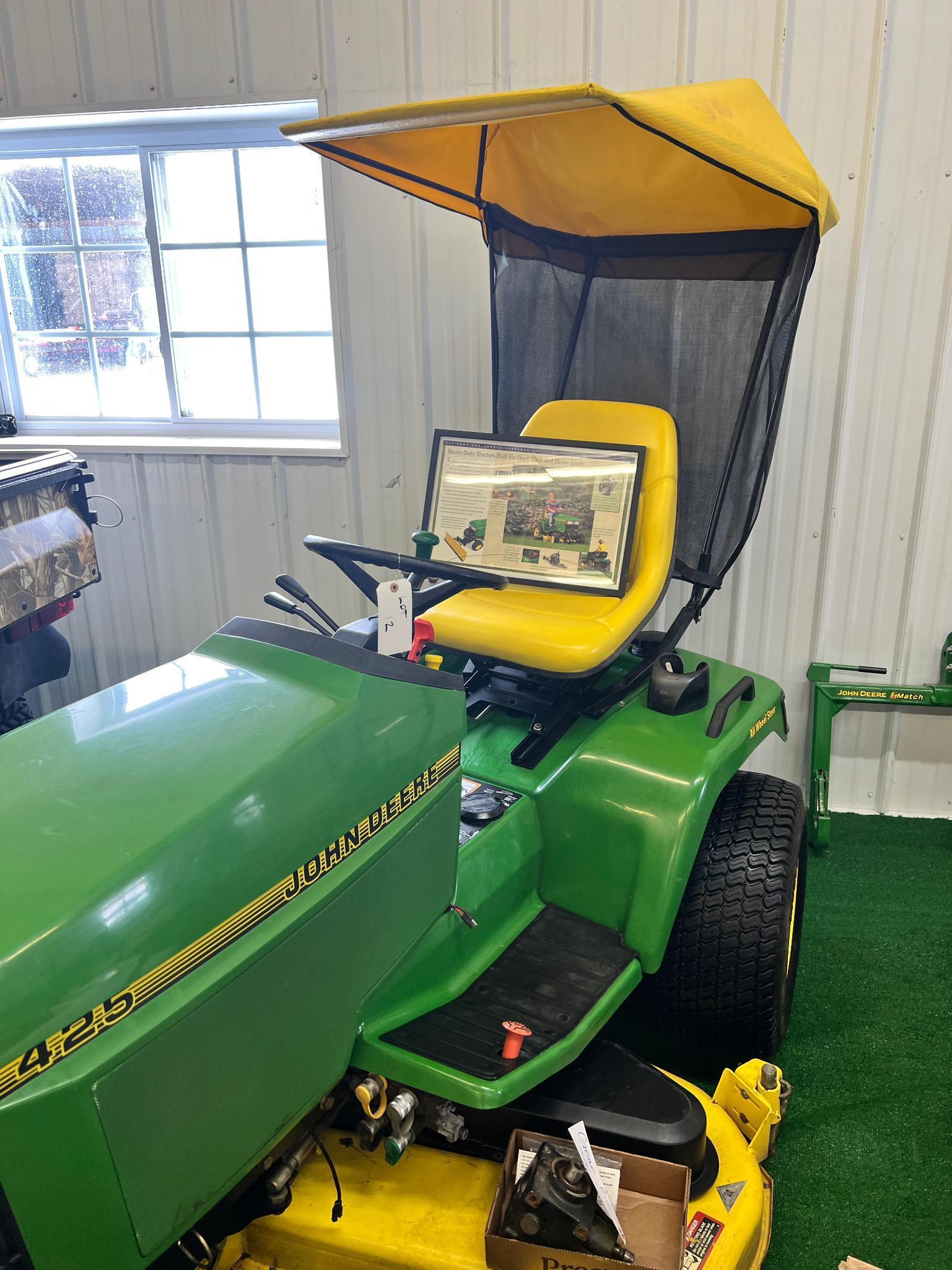 John Deere 425 Lawn Tractor w/  canopy, All wheel steer, showing 450 hours