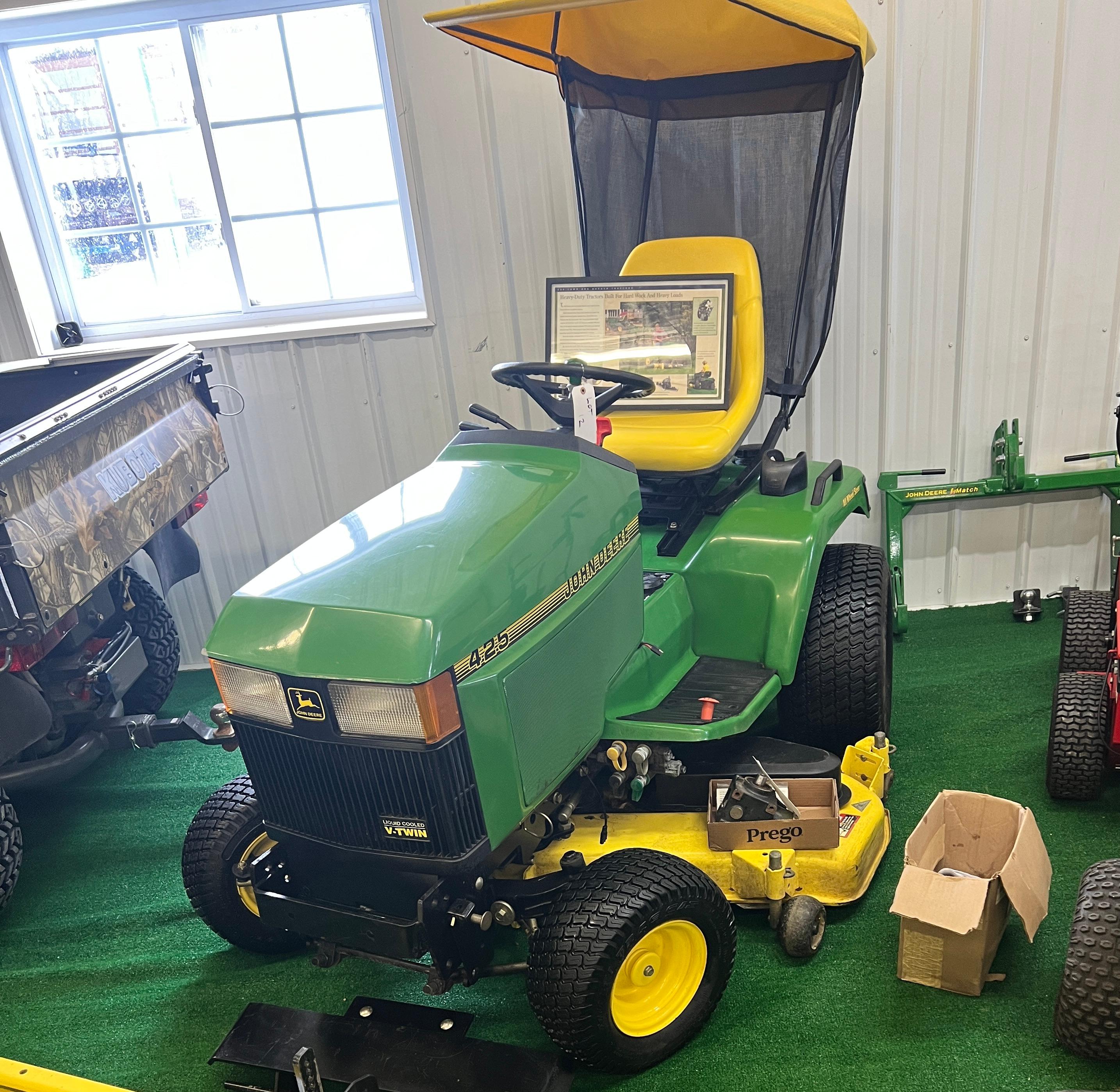 John Deere 425 Lawn Tractor w/  canopy, All wheel steer, showing 450 hours