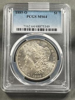 1885-O Morgan Silver Dollar in PCGS MS64 Holder