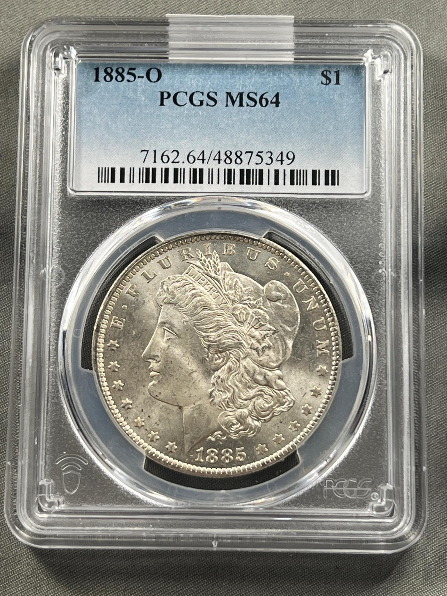 1885-O Morgan Silver Dollar in PCGS MS64 Holder