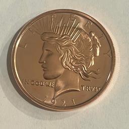 ONE OUNCE .999 COPPER ROUND, MADE IN THE LIKENESS OF A 1921 PEACE DOLLAR