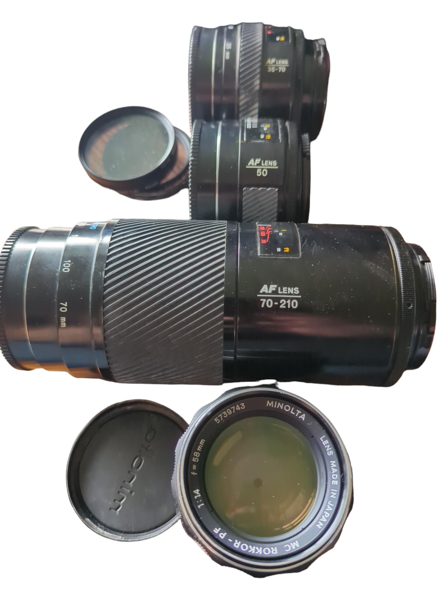 Minolta Maxxum 7000 SLR film camera bundle with four lenses