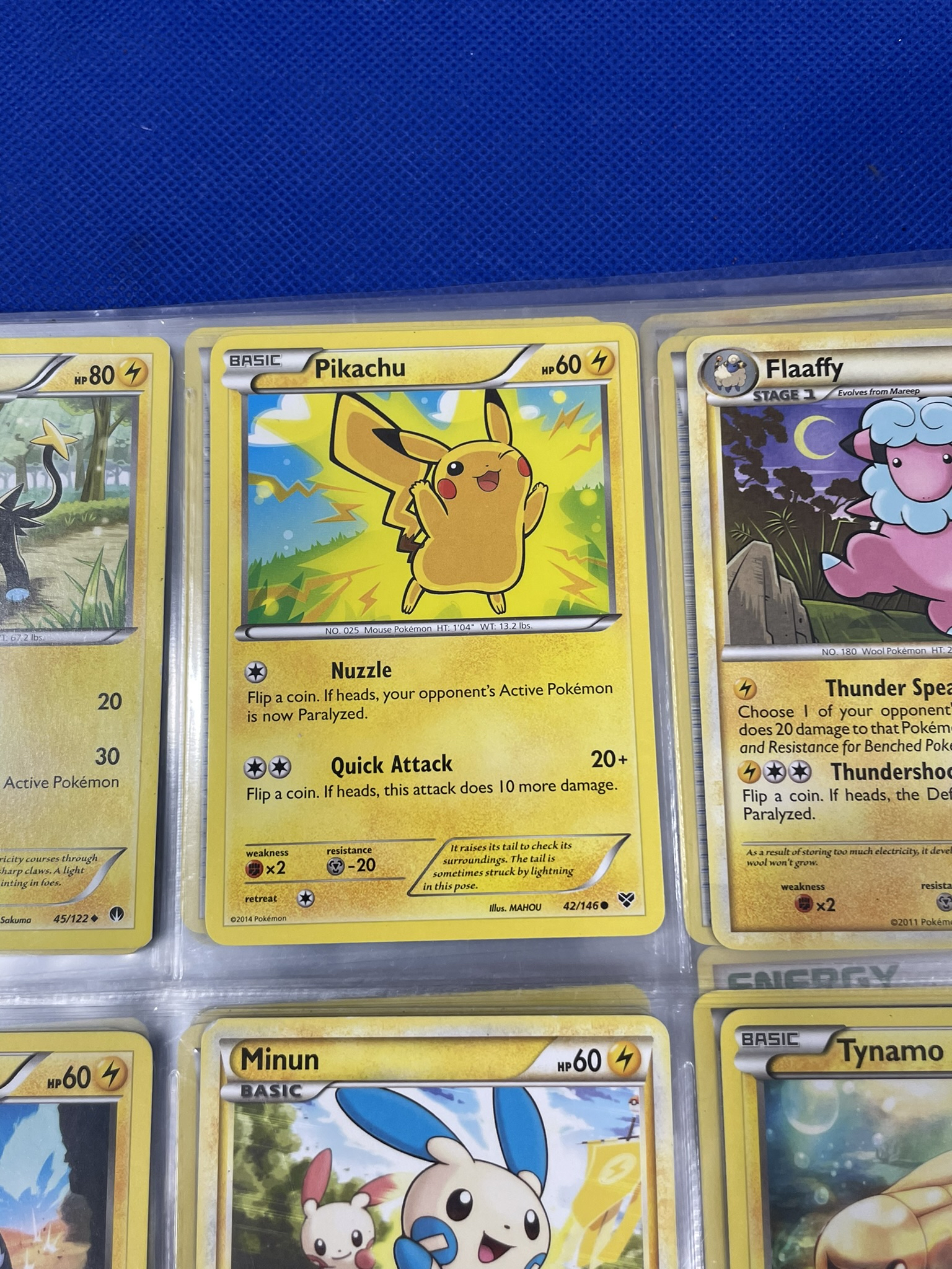 PokŽmon cards in binder