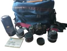 Minolta Maxxum 7000 SLR film camera bundle with four lenses