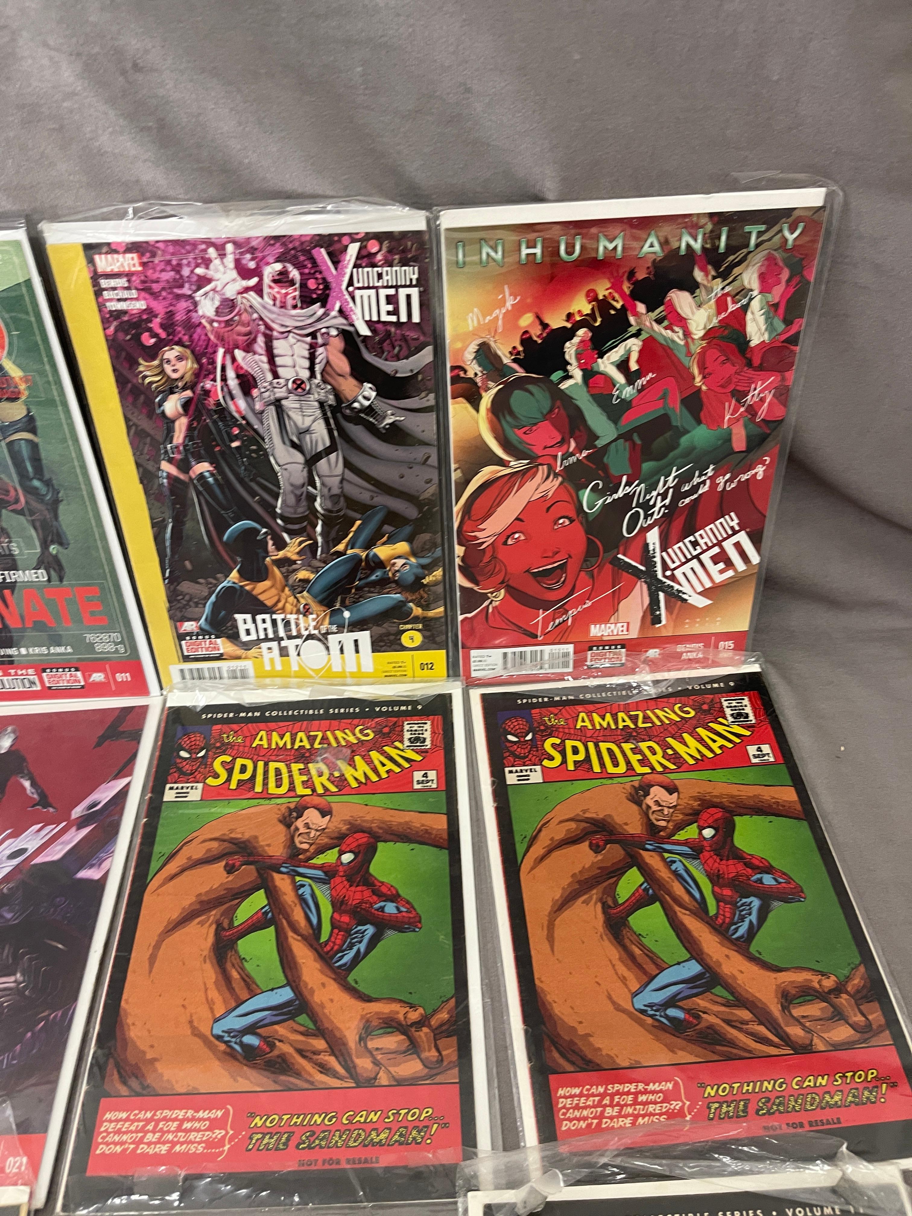 Spiderman Collectible Series and Uncanny X-Men Comic Book Lot