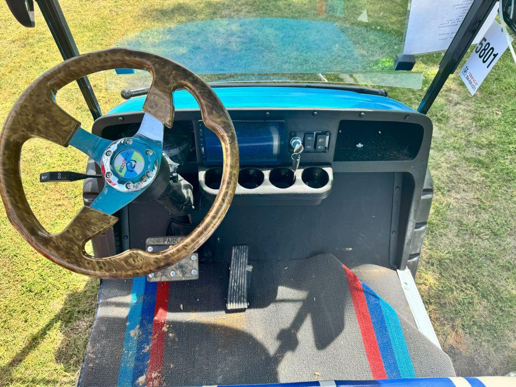 Blue 6-seater golf cart