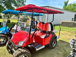 Red 4-seater golf cart