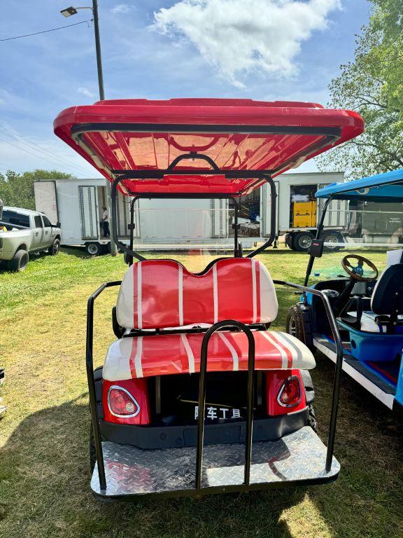 Red 4-seater golf cart