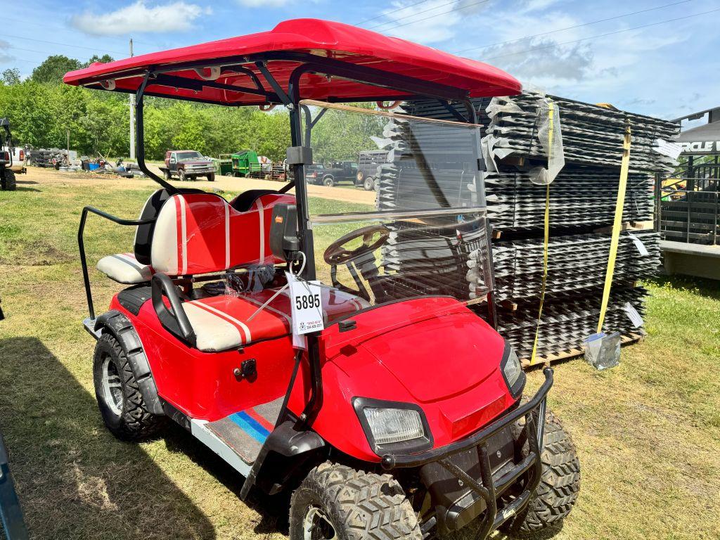 Red 4-seater golf cart