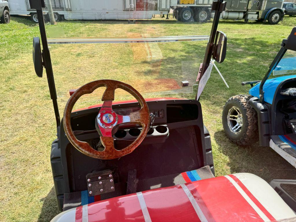 Red 4-seater golf cart