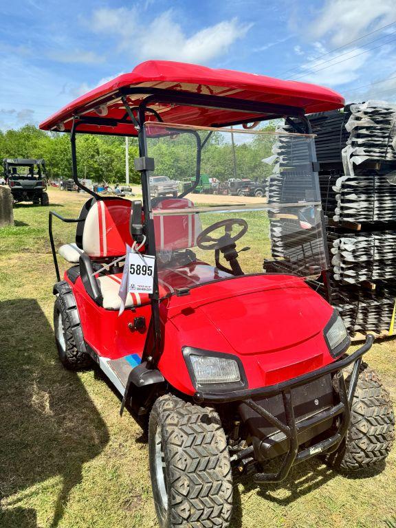 Red 4-seater golf cart