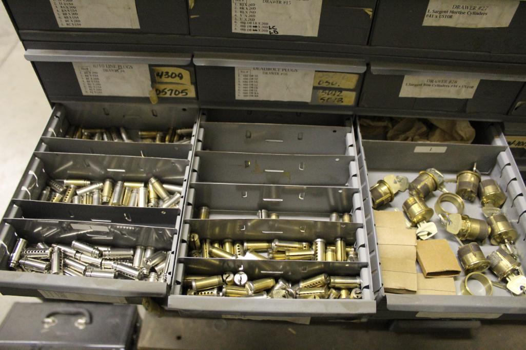 48-Drawer Organizer with Assorted Plugs, Cylinders, Mortise Cylinders, Cams and Shells.