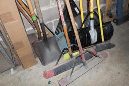 Lot of Brooms and Shovels
