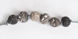 Group of Three Ecuadorian Spindle Whorl Bracelets