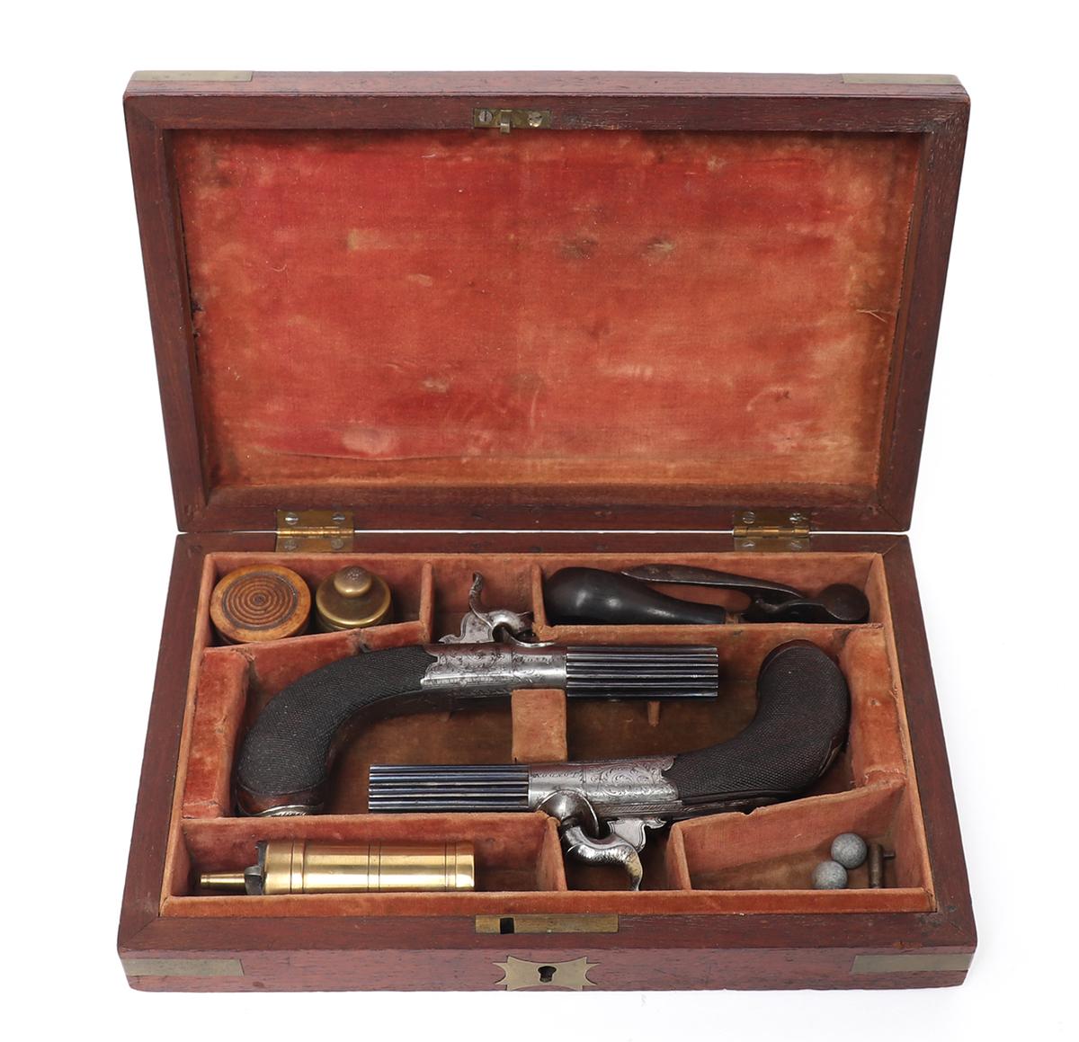 Excellent Pair of Silver, Fluted & Cased London Pistols by Manton