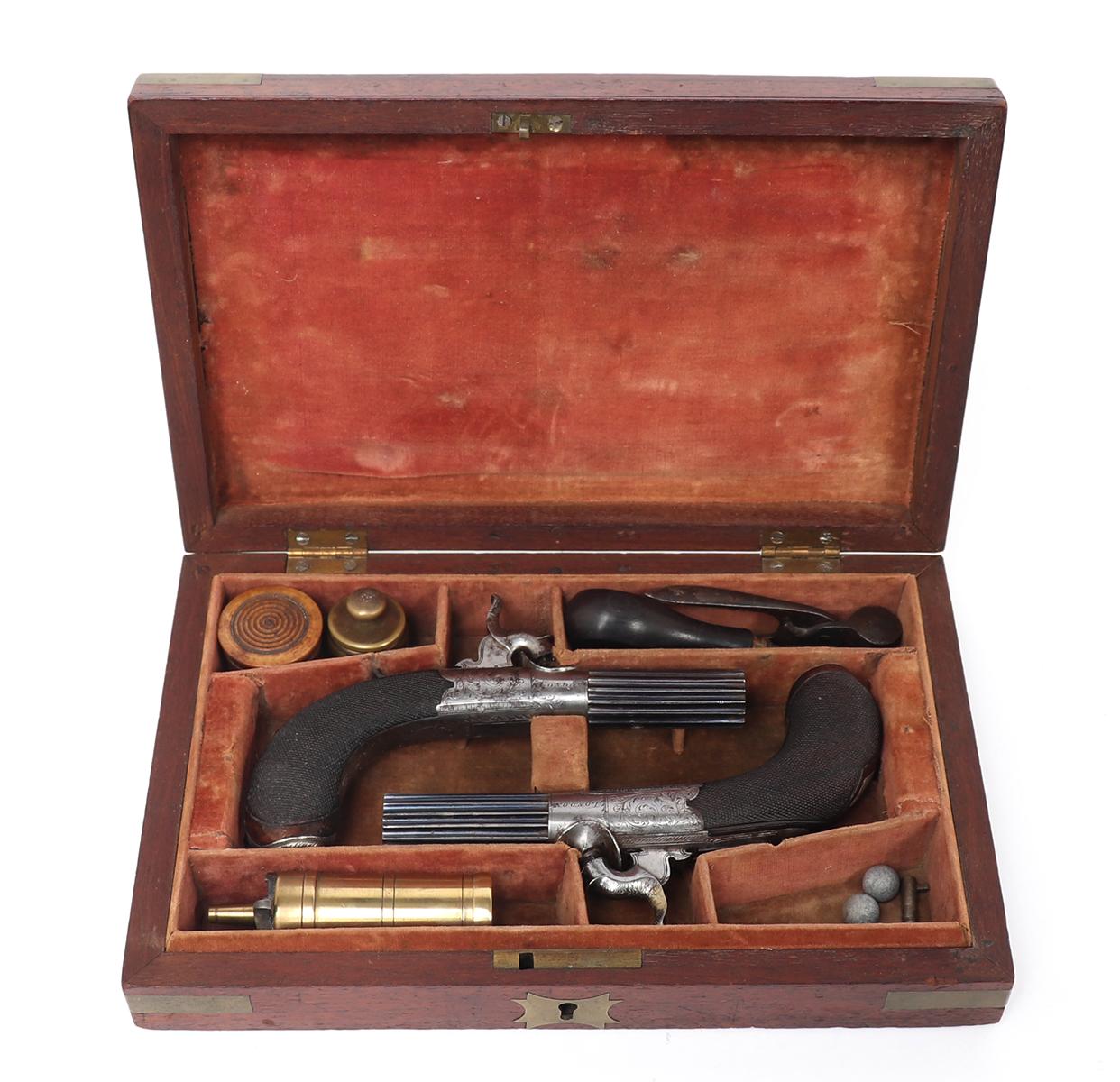 Excellent Pair of Silver, Fluted & Cased London Pistols by Manton