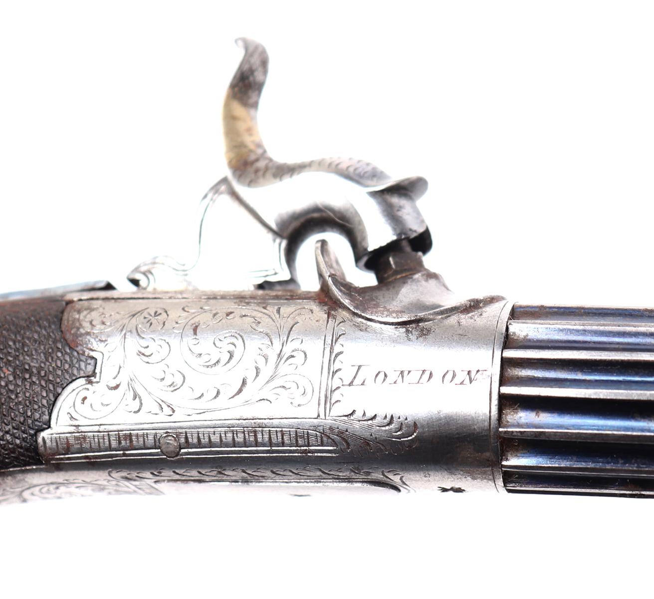 Excellent Pair of Silver, Fluted & Cased London Pistols by Manton