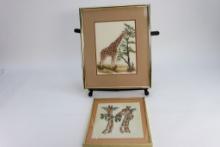 Two Framed Needlepoint Giraffes