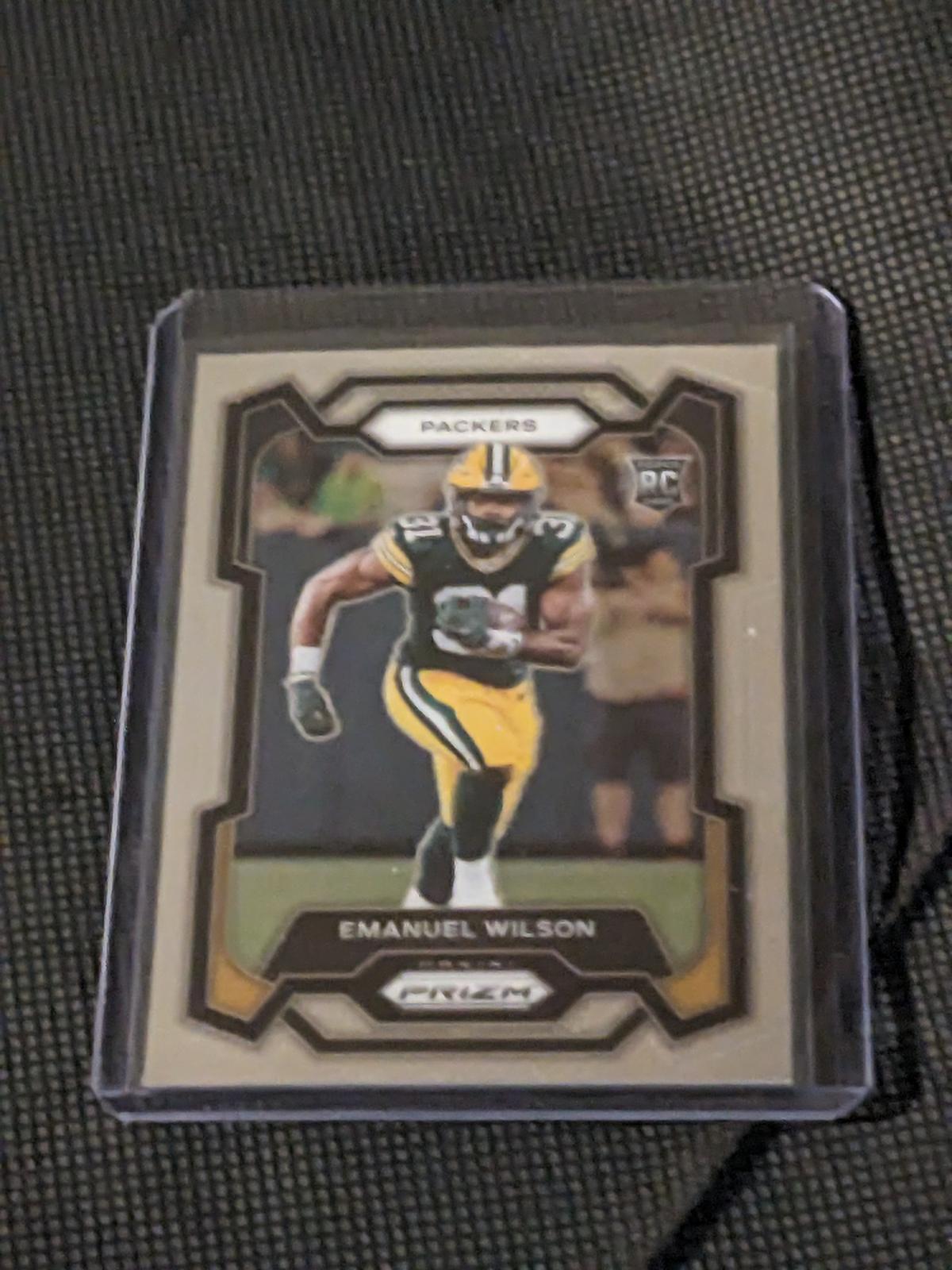 2023 Panini Prizm Football Emanuel Wilson Base Rookie RC #335 Packers