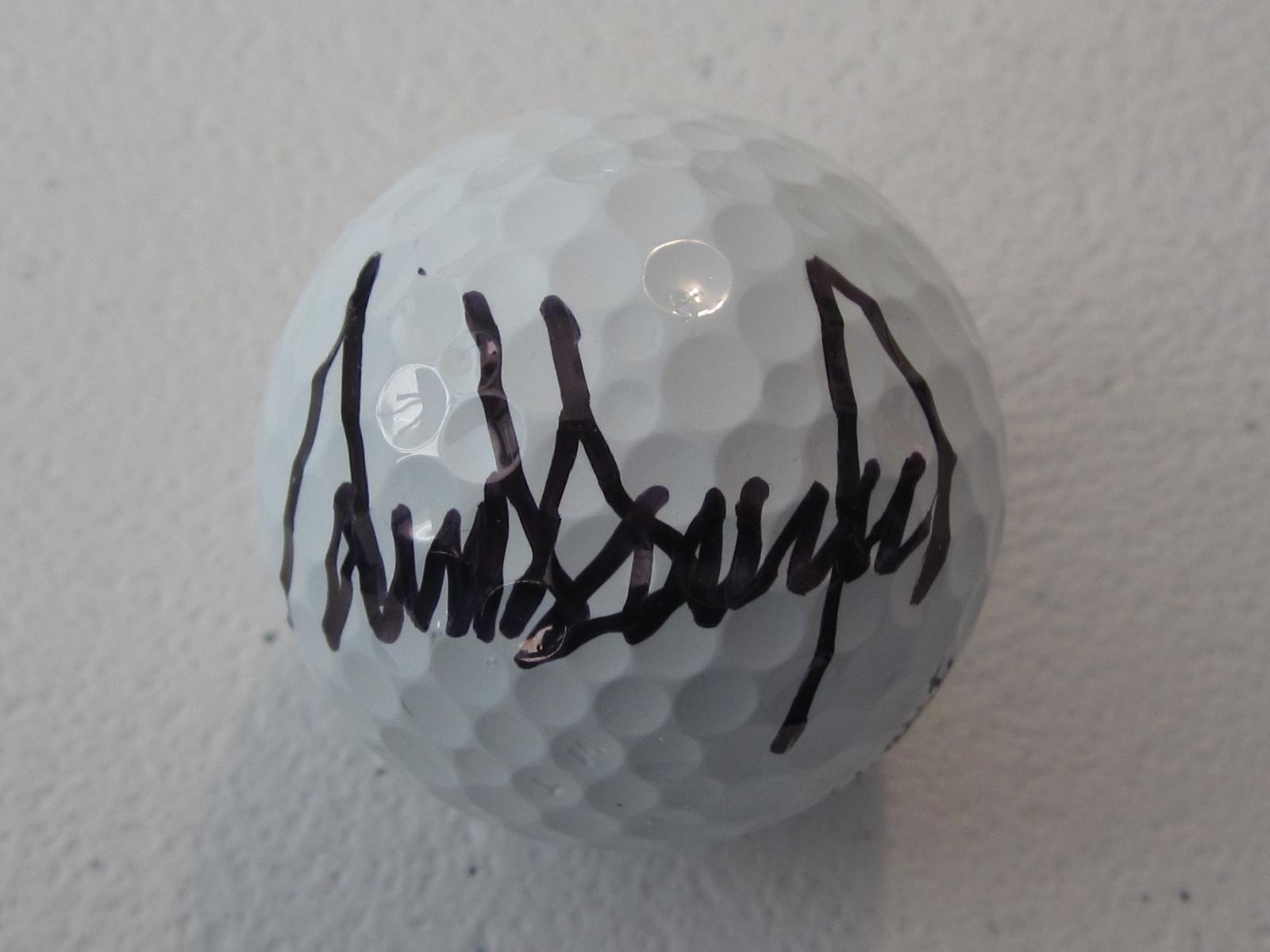 DONALD TRUMP SIGNED GOLF BALL WITH COA