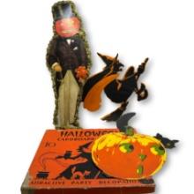 Vintage Pumpkin Man with Cardboard Halloween Cutouts