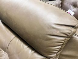Brown leather rocking recliner chair