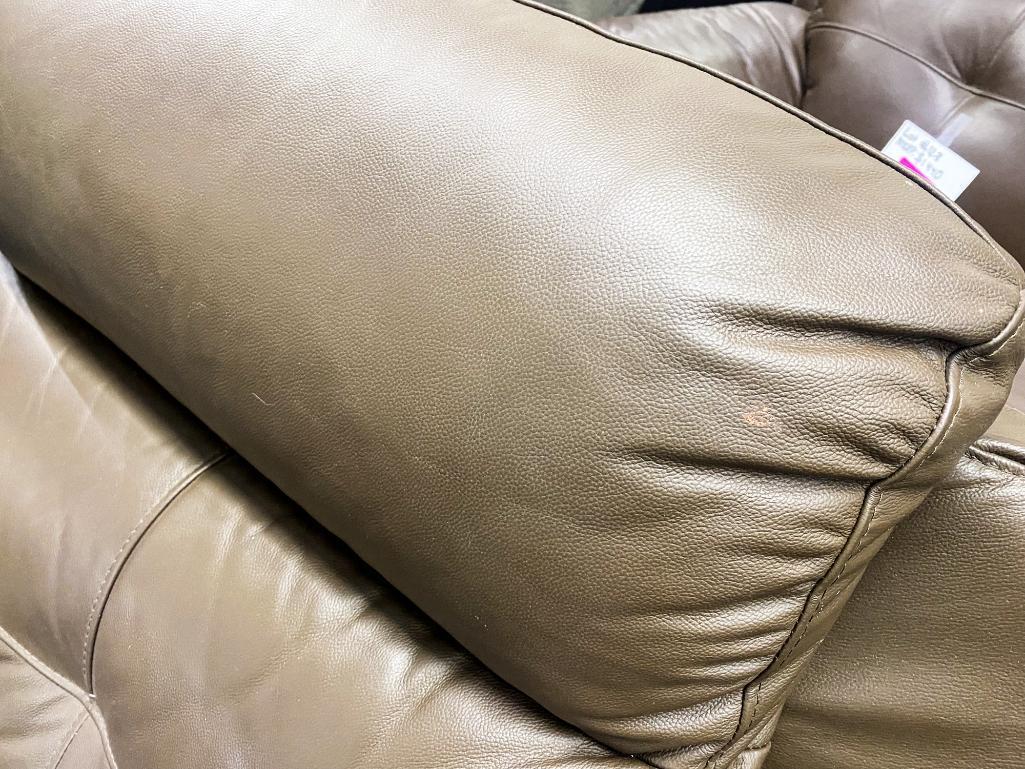 Brown leather rocking recliner chair