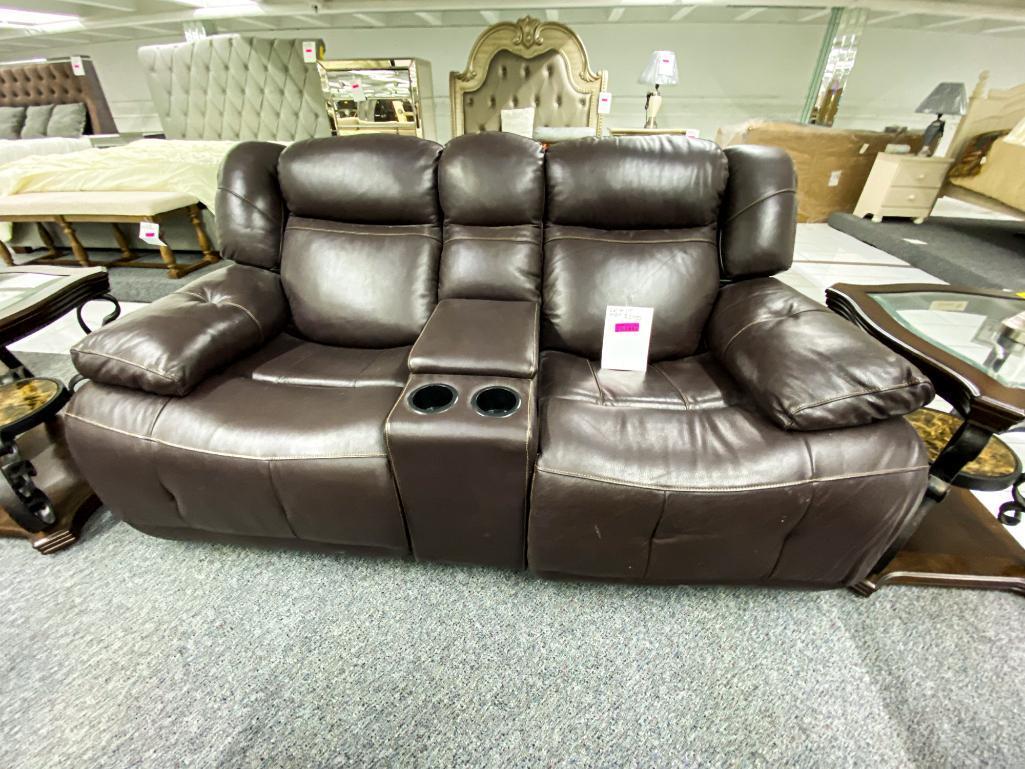 Dark brown loveseat with middle storage console