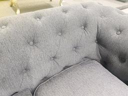 Grey fabric loveseat