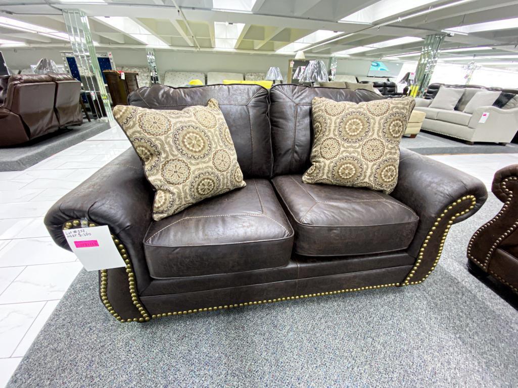 Brown fabric two-seater loveseat