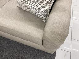 Light gray fabric loveseat