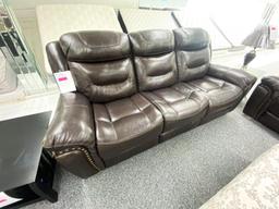 Dark brown leather sofa with electronic recliners. Included- Loveseat with electronic recliners, and