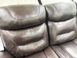 Dark brown leather sofa with electronic recliners. Included- Loveseat with electronic recliners, and