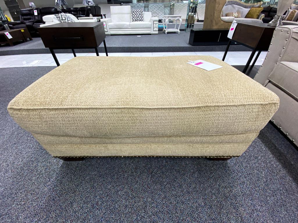 Tan soft-fabric ottoman