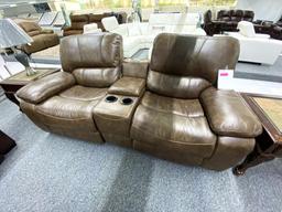 Traditional brown loveseat with speakers and illuminated cupholders