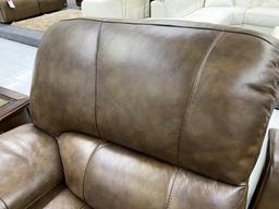 Traditional brown loveseat with speakers and illuminated cupholders