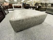 Grey fabric/leather ottoman