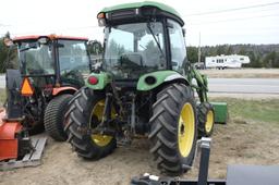 John Deere 4320 tractor with front bucket